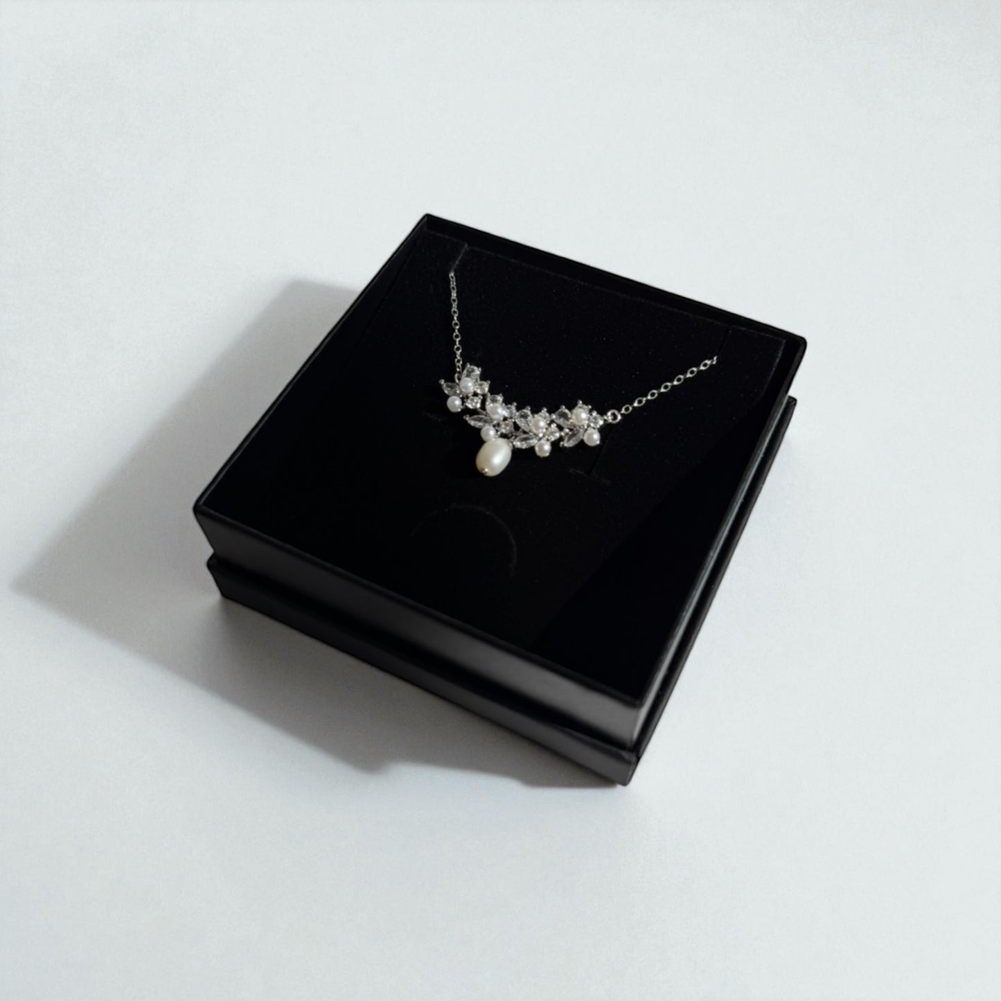 Theia V-shaped Pearl Pendant Necklace