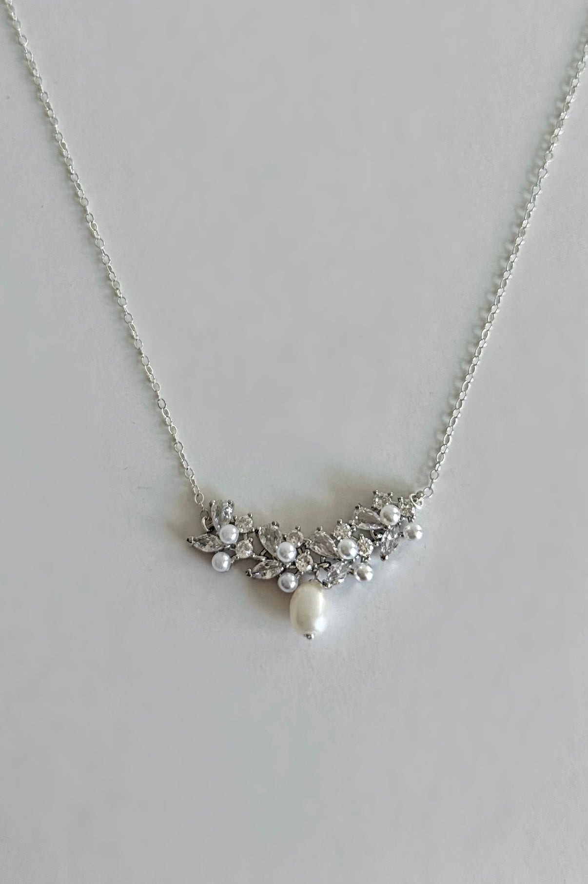 Theia V-shaped Pearl Pendant Necklace